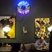 A diner sits under original paintings by a store employee as he waits for his breakfast at Angelo's on Tuesday, March 12, 2013. Melanie Maxwell I AnnArbor.com